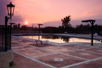 Bazén v ubytování Hotel Rural El Cortijo nebo v jeho okolí