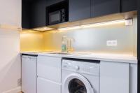 a kitchen with a washing machine and a sink at Marcq-en-Baroeul - beautiful fully equipped ! 2p in Marcq-en-Baroeul