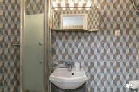 a bathroom with a sink and a mirror at MBA - Splendide Appart - Gambey 1 - Proche République in Paris