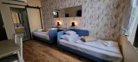 Posteľ alebo postele v izbe v ubytovaní Boutique Hotel & Event Center