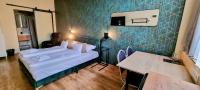 Posteľ alebo postele v izbe v ubytovaní Boutique Hotel & Event Center