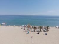 A beach at or near az apartmanhoteleket