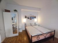 Posteľ alebo postele v izbe v ubytovaní Budapest A+ Apartment