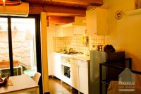 Kuchyňa alebo kuchynka v ubytovaní Casa vacanza home Ragusa
