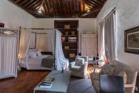 A bed or beds in a room at Isla Baja Suites