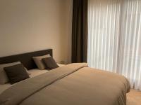 Cama ou camas em um quarto em Vakantiehuis En Passant