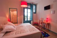 Posteľ alebo postele v izbe v ubytovaní Hotel Hostal Chic