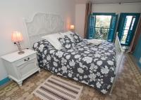 Posteľ alebo postele v izbe v ubytovaní Hotel Hostal Chic