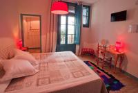 Posteľ alebo postele v izbe v ubytovaní Hotel Hostal Chic