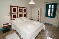 Posteľ alebo postele v izbe v ubytovaní Hotel Hostal Chic