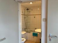 Een badkamer bij Plato by Hofstad Studio’s