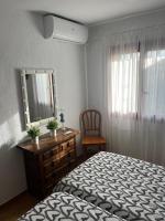 Postel nebo postele na pokoji v ubytování Apartamento Urb Oasis Park II Denia, las Marinas