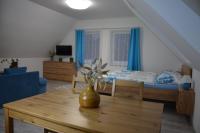 Postel nebo postele na pokoji v ubytování Apartmány Lukovské domečky