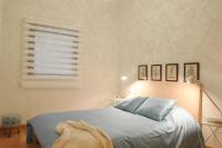 A bed or beds in a room at Moderno y Centrico Apartamento 1 dormitorio