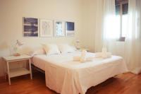 Posteľ alebo postele v izbe v ubytovaní Coqueto Apartamento Cerca del Centro Histórico