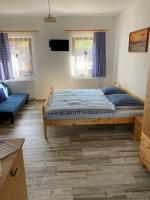 Postel nebo postele na pokoji v ubytování Apartmán Dolánek