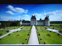 a large building with a grassy yard in front of it at Gîte Valençay, 4 pièces, 6 personnes - FR-1-591-148 in Valençay