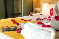 Hôtel de France, un hôtel AMMIにあるベッド