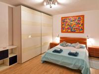 A bed or beds in a room at Comodo appartamento Casa Razzoli