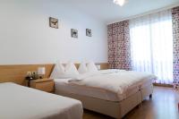 Łóżko lub łóżka w pokoju w obiekcie Hotel HAAS