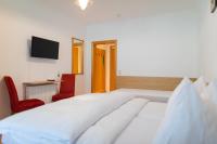 Łóżko lub łóżka w pokoju w obiekcie Hotel HAAS
