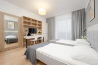 Postel nebo postele na pokoji v ubytování Business Studio Apartments Wolska by Noclegi Renters