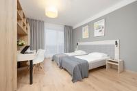 Postel nebo postele na pokoji v ubytování Business Studio Apartments Wolska by Noclegi Renters