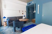 Posteľ alebo postele v izbe v ubytovaní The Ruck Hotel