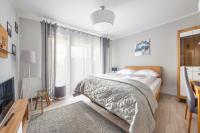 Posteľ alebo postele v izbe v ubytovaní Apartamenty Sun & Snow Rezydencja Park