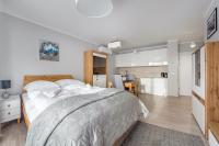 Posteľ alebo postele v izbe v ubytovaní Apartamenty Sun & Snow Rezydencja Park