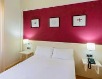 Postel nebo postele na pokoji v ubytování Hotel Palacios