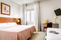 Postel nebo postele na pokoji v ubytování Hotel Palacios