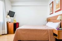 Postel nebo postele na pokoji v ubytování Hotel Palacios