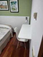 Posteľ alebo postele v izbe v ubytovaní Hostal La Frontera
