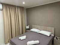 Posteľ alebo postele v izbe v ubytovaní Mignone Luxury House