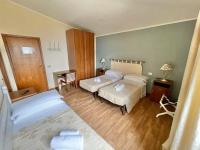 Posteľ alebo postele v izbe v ubytovaní Hotel Ristorante La Sorgente
