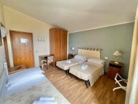 Posteľ alebo postele v izbe v ubytovaní Hotel Ristorante La Sorgente