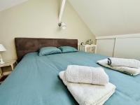 Posteľ alebo postele v izbe v ubytovaní Superbe appartement Emplacement exceptionnel cœur des Sables - 4 pers