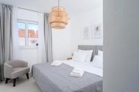 Posteľ alebo postele v izbe v ubytovaní Exclusive Seafront Suite with jacuzzi