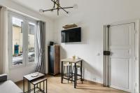 821 Suite Licorne - Superb apartment tesisinde bir televizyon ve/veya e&#x11F;lence merkezi