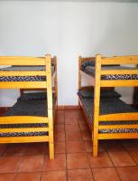 A bed or beds in a room at Albergue Santa Ana