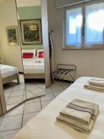 Posteľ alebo postele v izbe v ubytovaní Bnbook Lago Maggiore Studio 2