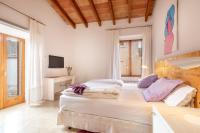 A bed or beds in a room at Can Tem Turismo de Interior
