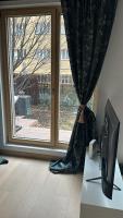 TV a/nebo společenská místnost v ubytování Apartments Palmovka