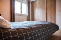 Ein Bett oder Betten in einem Zimmer der Unterkunft Appartement R&eacute;sidence Villeneuve