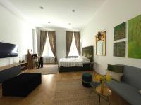 Televízia a/alebo spoločenská miestnosť v ubytovaní Premium Class Apartments III