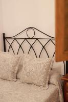 A bed or beds in a room at Casa rural La Aldea