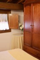 A bed or beds in a room at Casa rural La Aldea