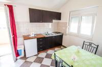 Kuchyňa alebo kuchynka v ubytovaní Apartment in Kakma/Biograd Riviera 40380