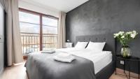 Posteľ alebo postele v izbe v ubytovaní Flatbook - City Center SPA Apartments 6B,C